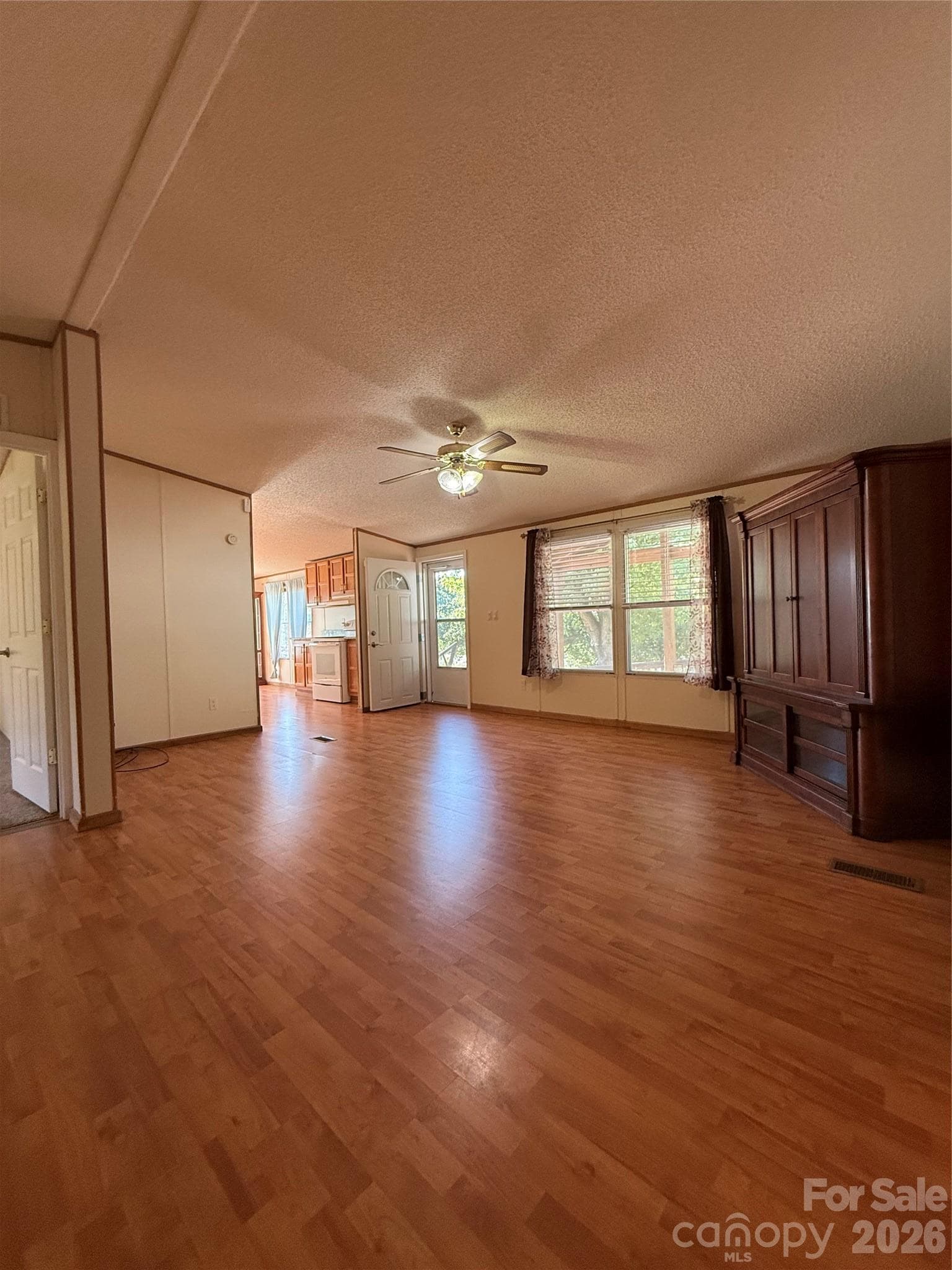 Spacious living room open to the kitchen and bedrooms - 97 Fair Haven Drive, Burnsville