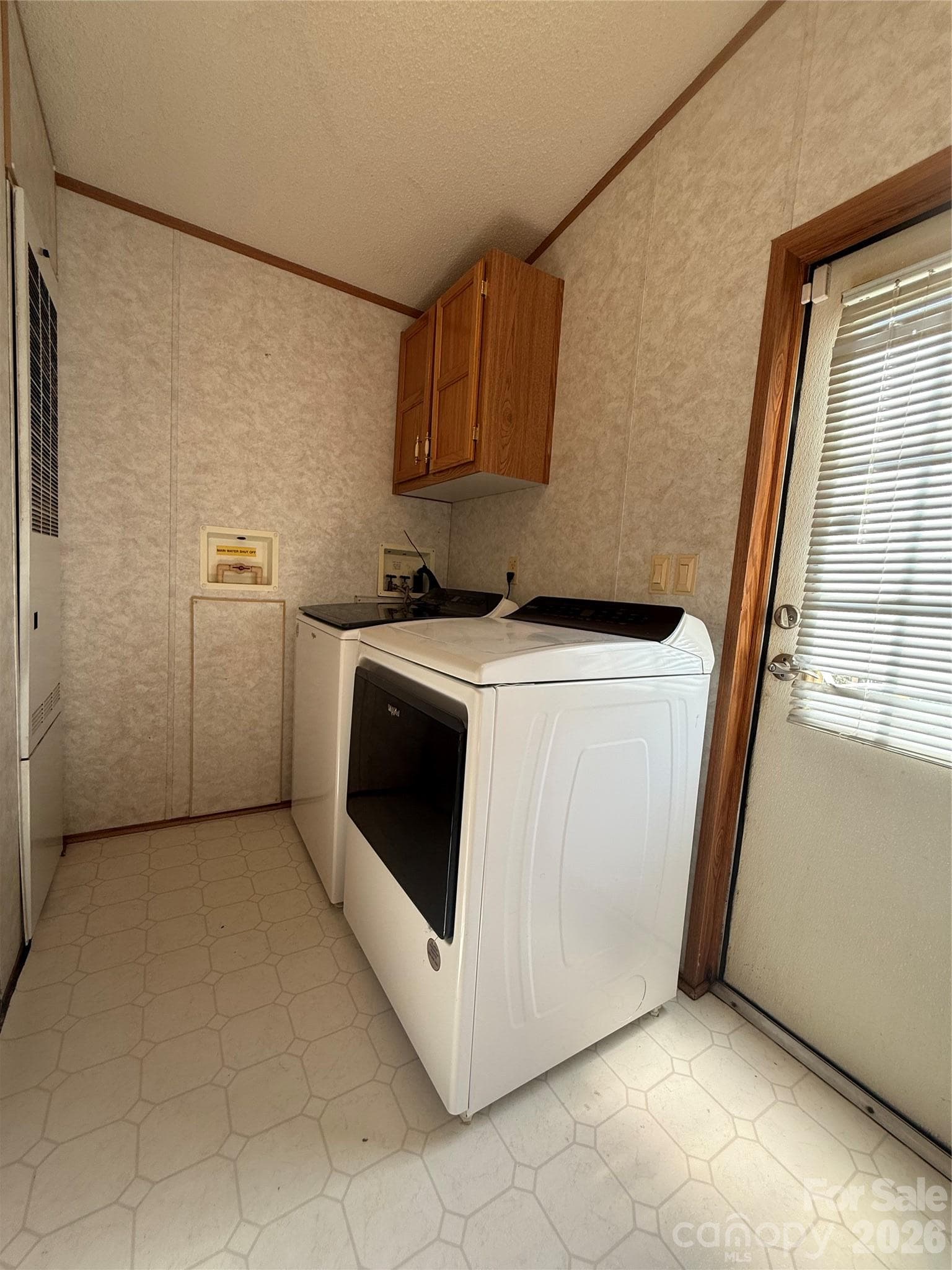 Laundry area and side entrance - 97 Fair Haven Drive, Burnsville