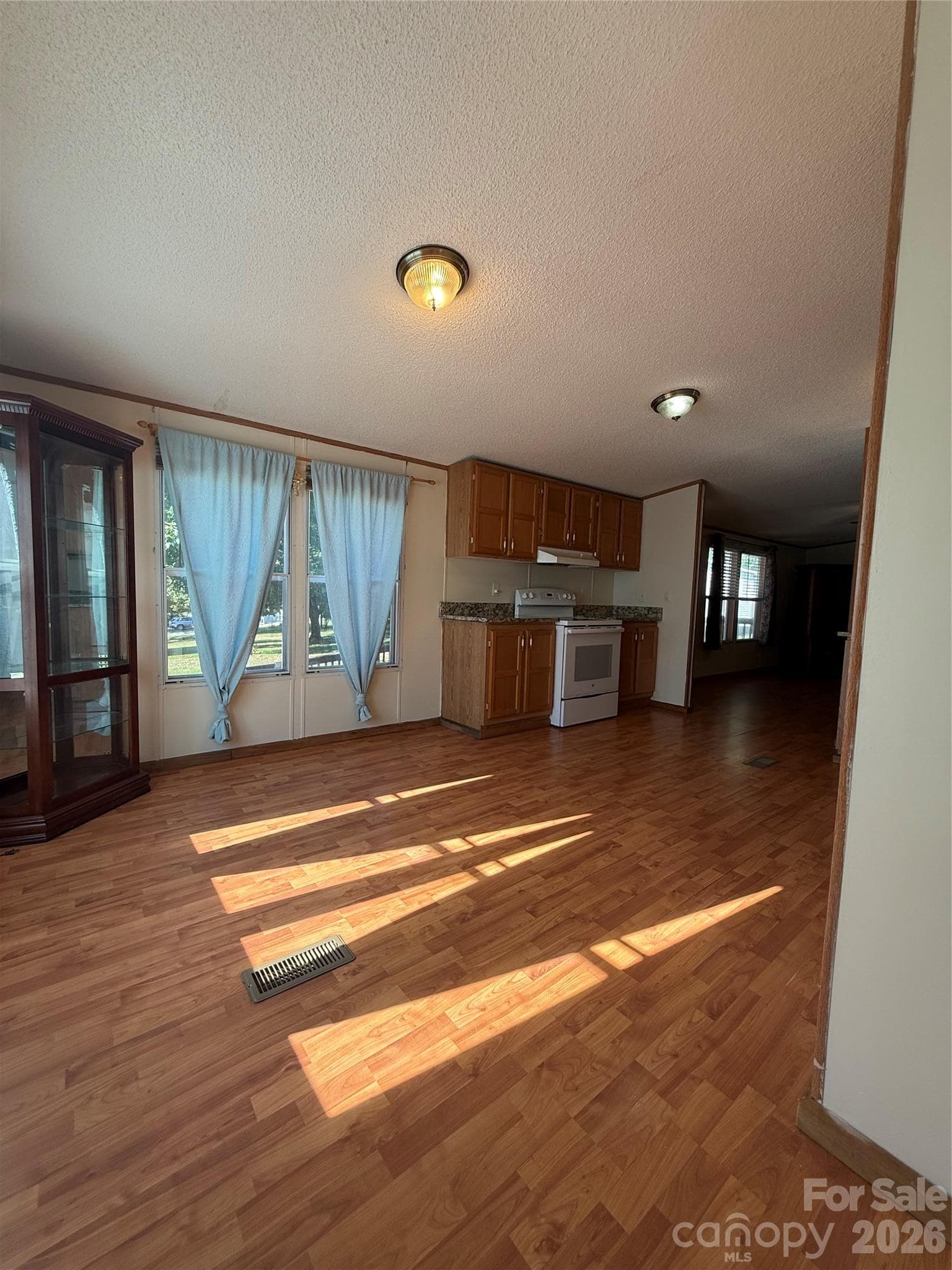 Kitchen view from the laundry area - 97 Fair Haven Drive, Burnsville