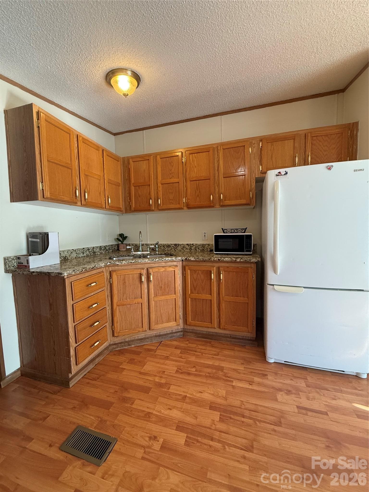 Oak cabinets and granite countertops - 97 Fair Haven Drive, Burnsville