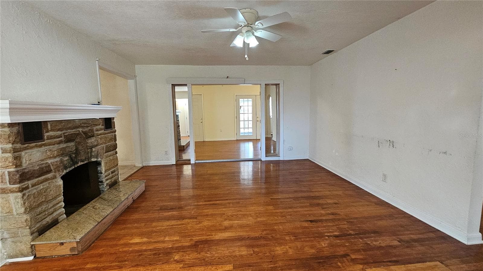 Living room with fire place - 25 E CHESLEY AVE, EUSTIS