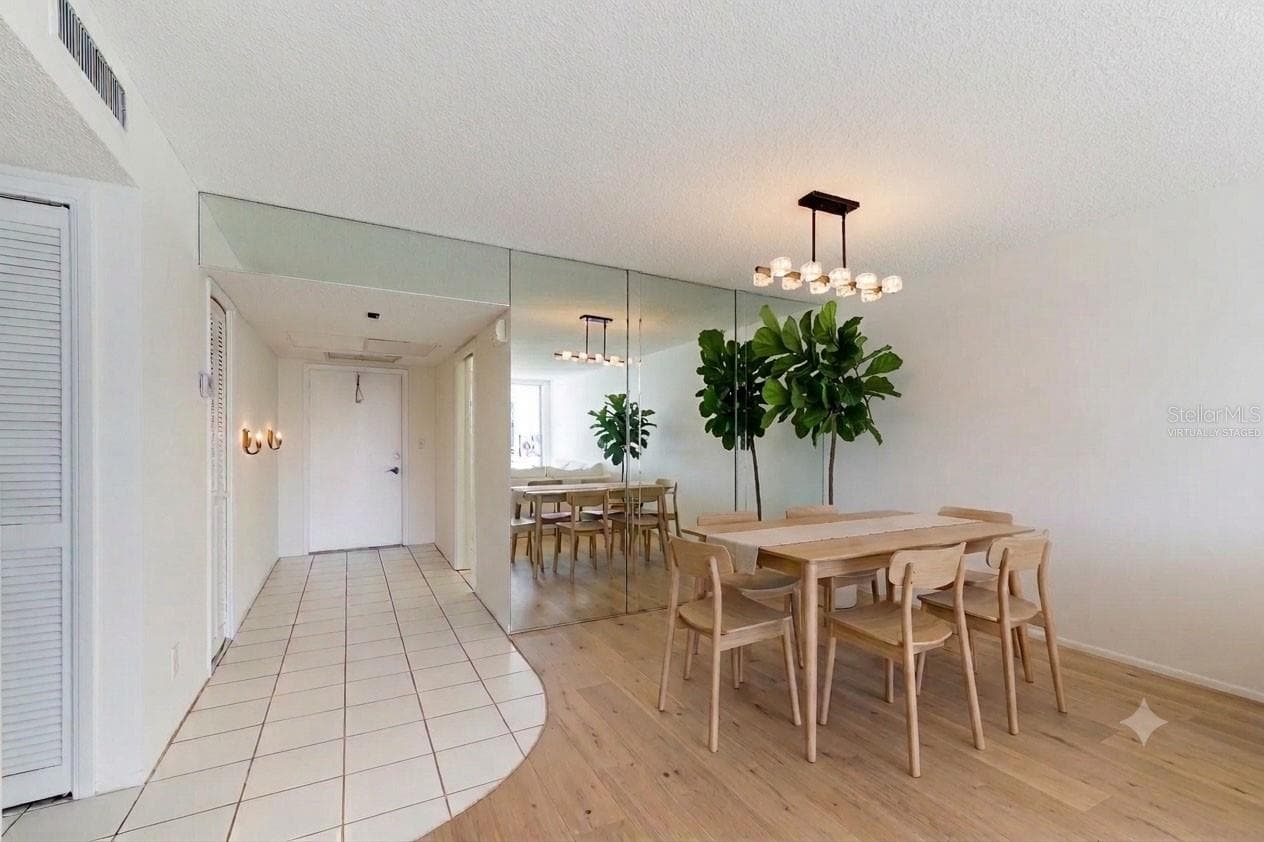 Virtually Staged - Dining & Foyer - 605 OAKS DR #607, POMPANO BEACH