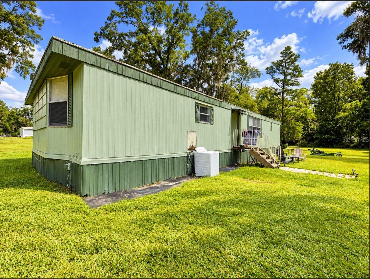 Manufactured Home at 4980 SE 14TH ST, SUMMERFIELD, photo 5 of 9