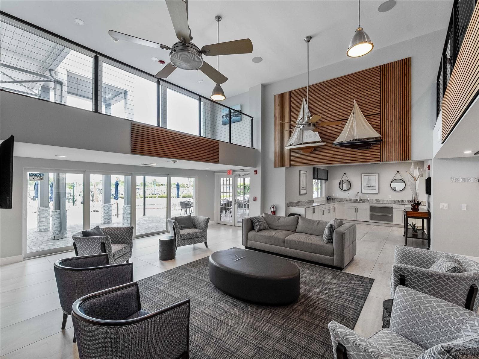 Community clubhouse lounge - 102 WINDWARD DR, OSPREY