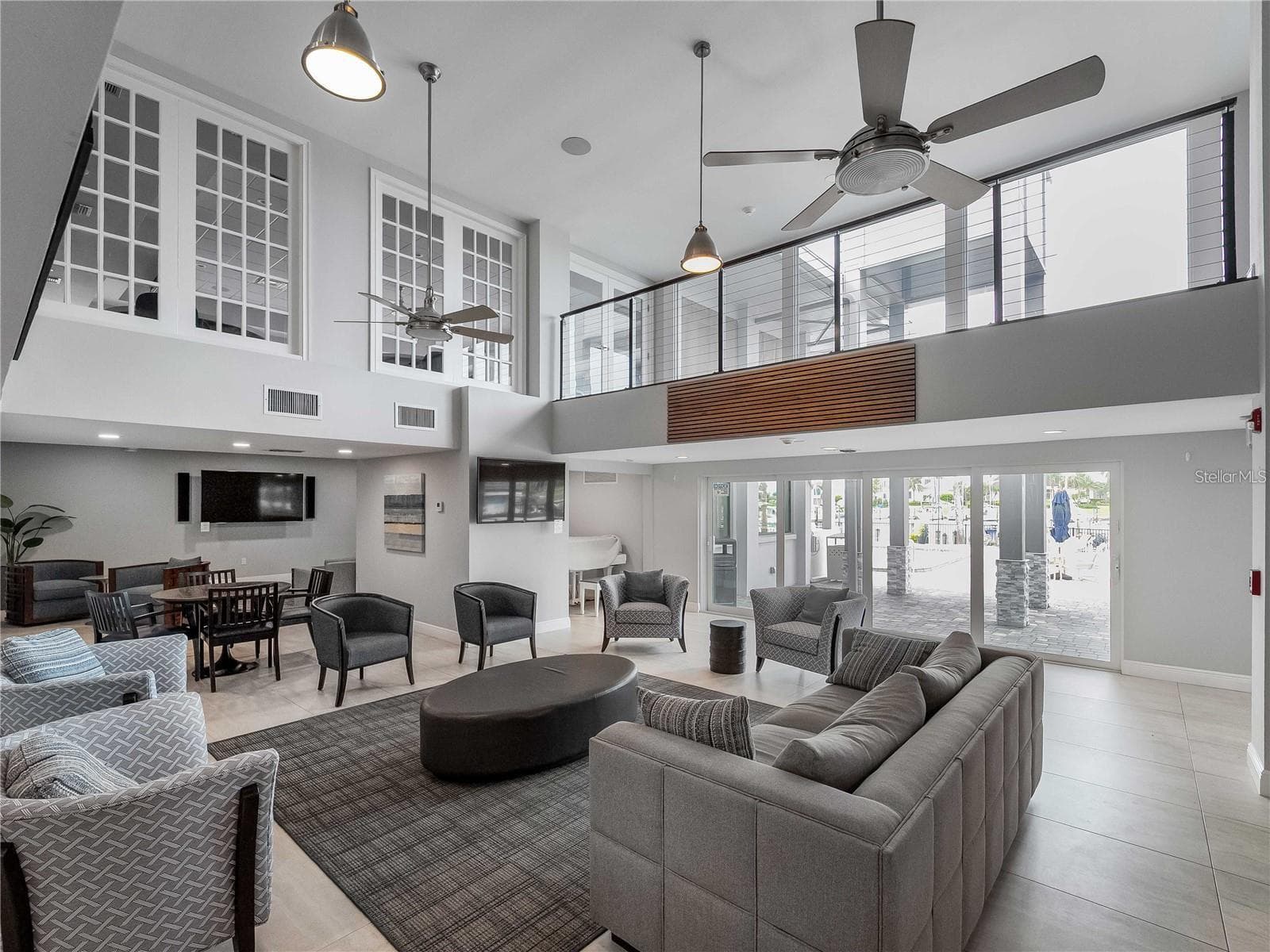 Community clubhouse lounge - 102 WINDWARD DR, OSPREY