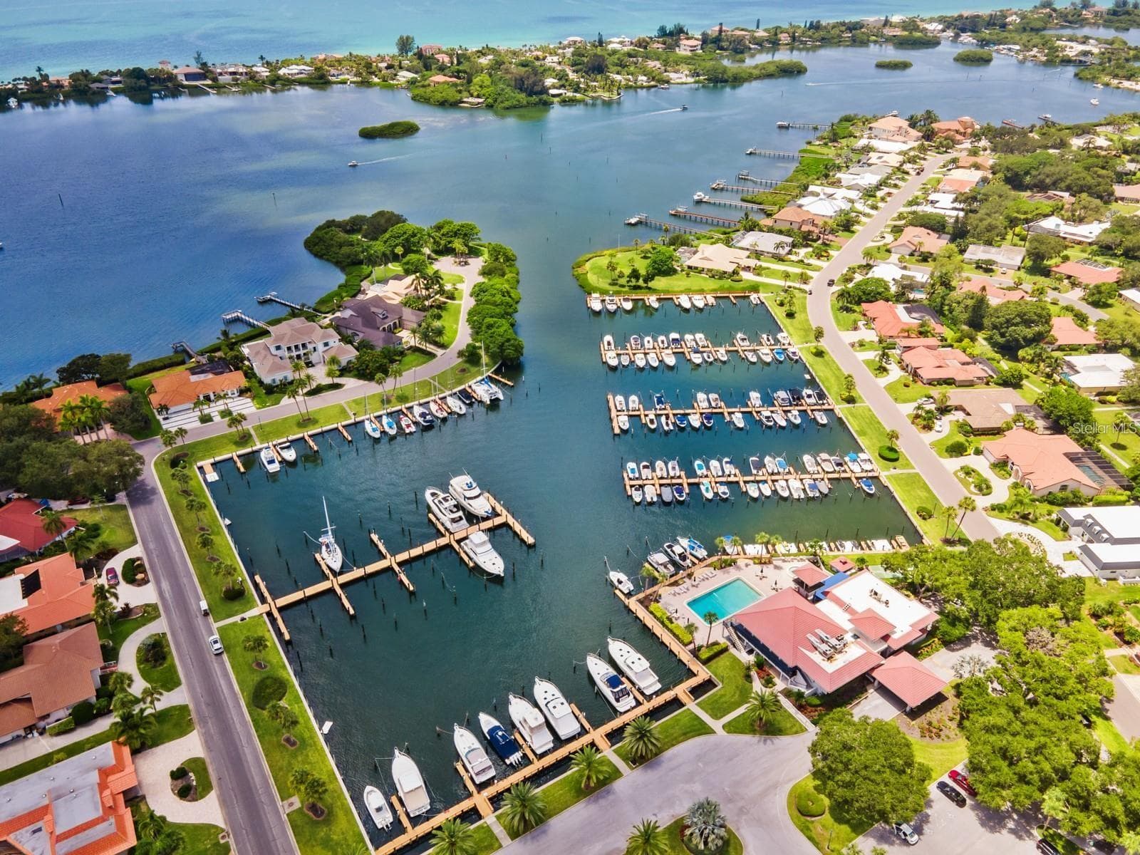 Community marina aerial view - 102 WINDWARD DR, OSPREY