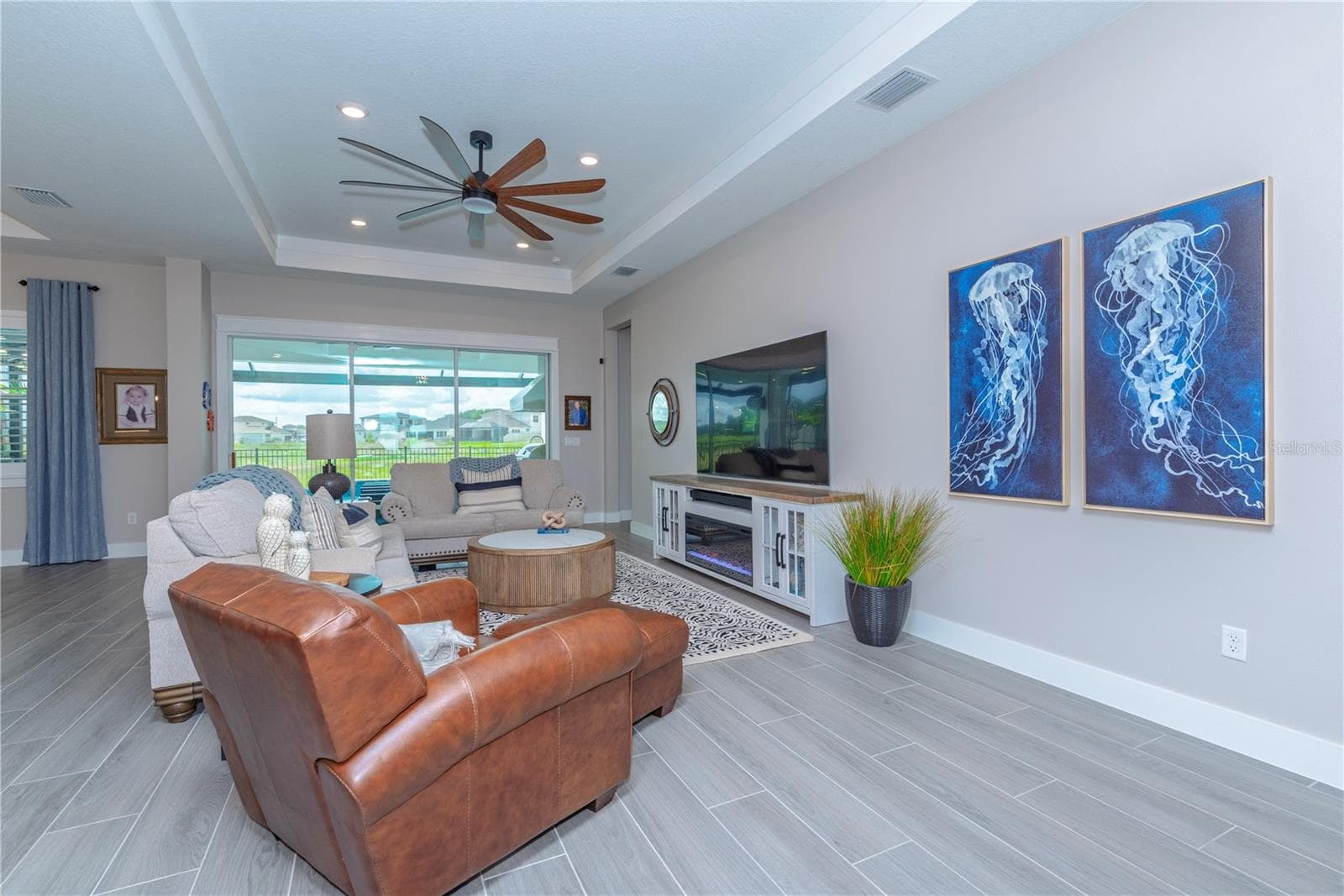 Downstairs living room is part of the great room. - 10706 TORCHWOOD SEA WAY, SAN ANTONIO