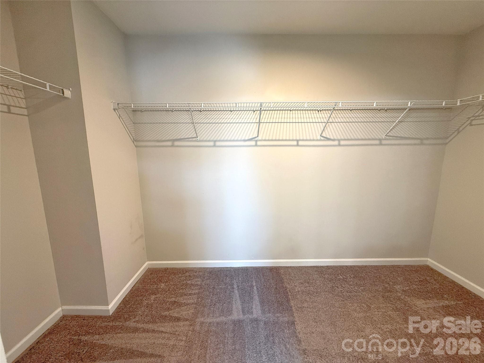 Primary Bedroom Walk-In Closet - 5113 Thomasville Drive, Belmont