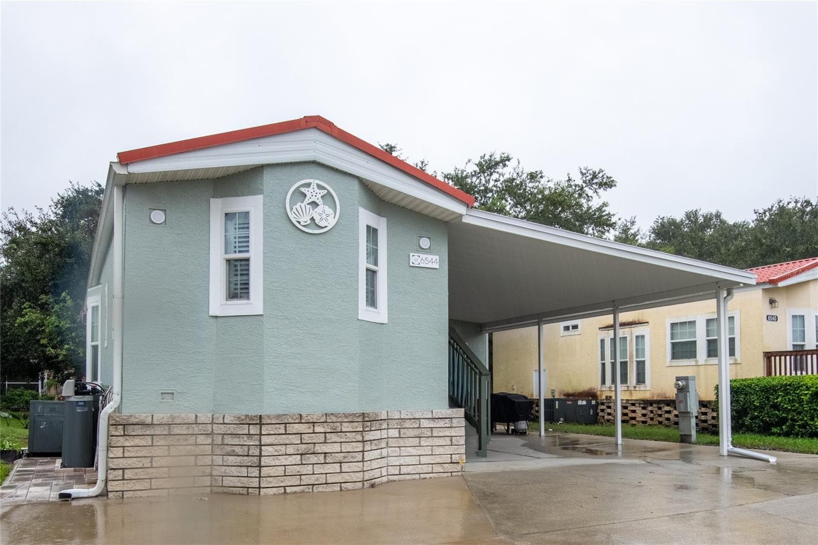 Manufactured Home at 6544 LA MESA RD, LAND O LAKES, photo 3 of 39