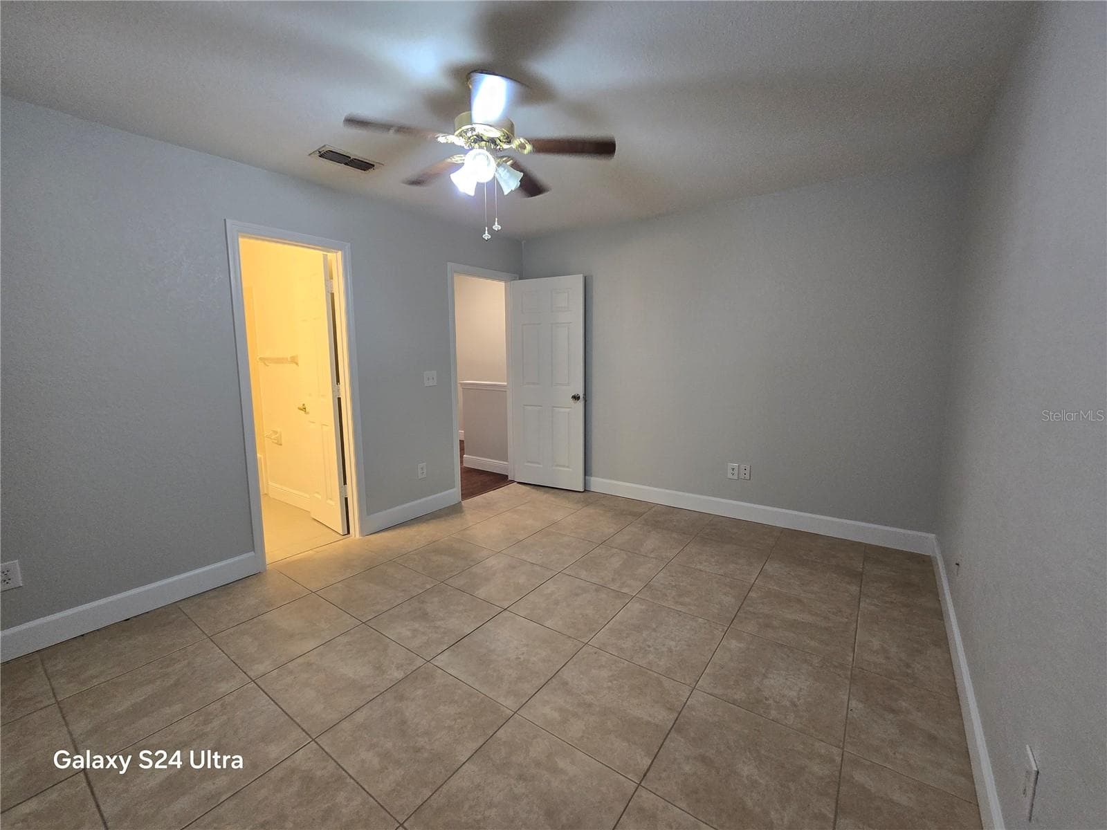 1st bedroom with tile floors - 1611 SHADY RIDGE CT #260, ORLANDO