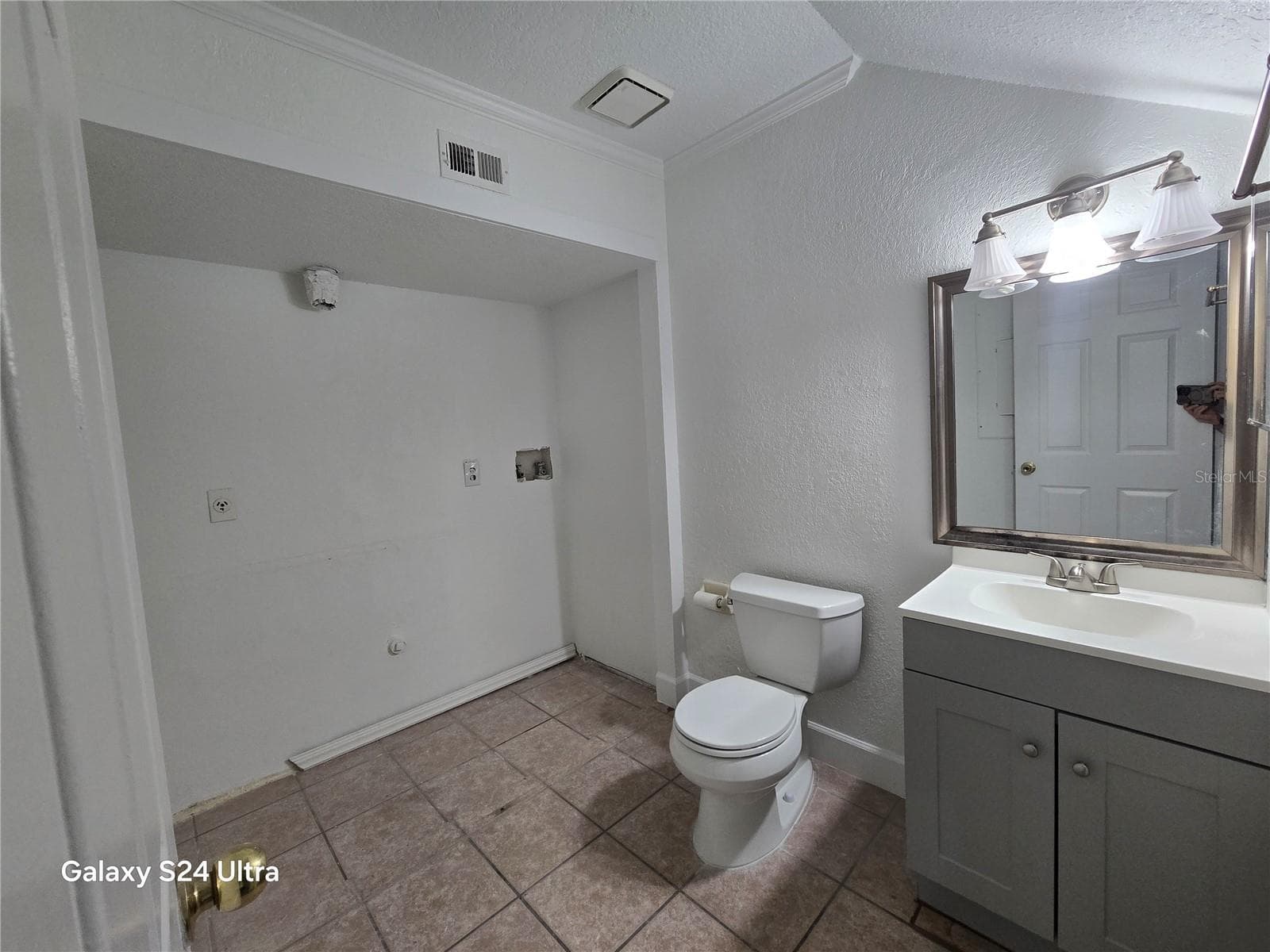 Half bathroom & laundry closet - 1611 SHADY RIDGE CT #260, ORLANDO