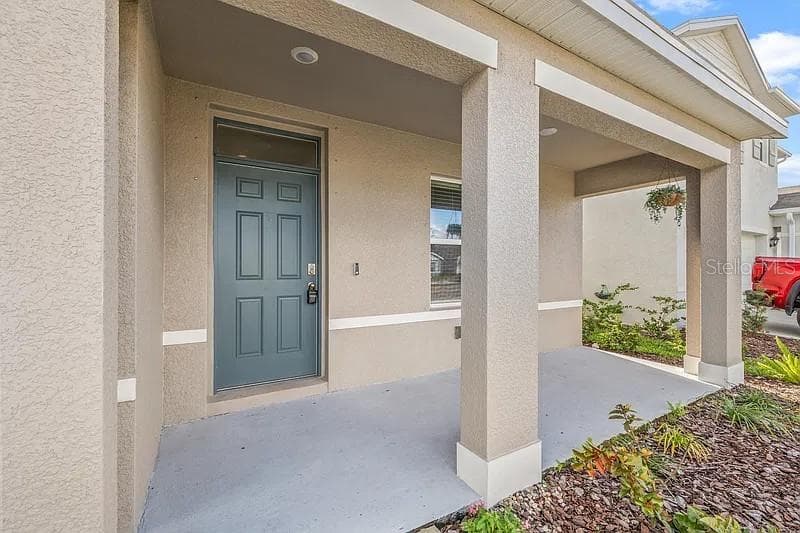 Covered large front porch - 17249 WHEATBERRY BLVD, PARRISH
