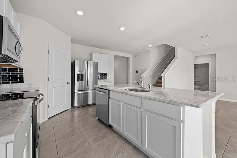 Kitchen from dining - 17249 WHEATBERRY BLVD, PARRISH