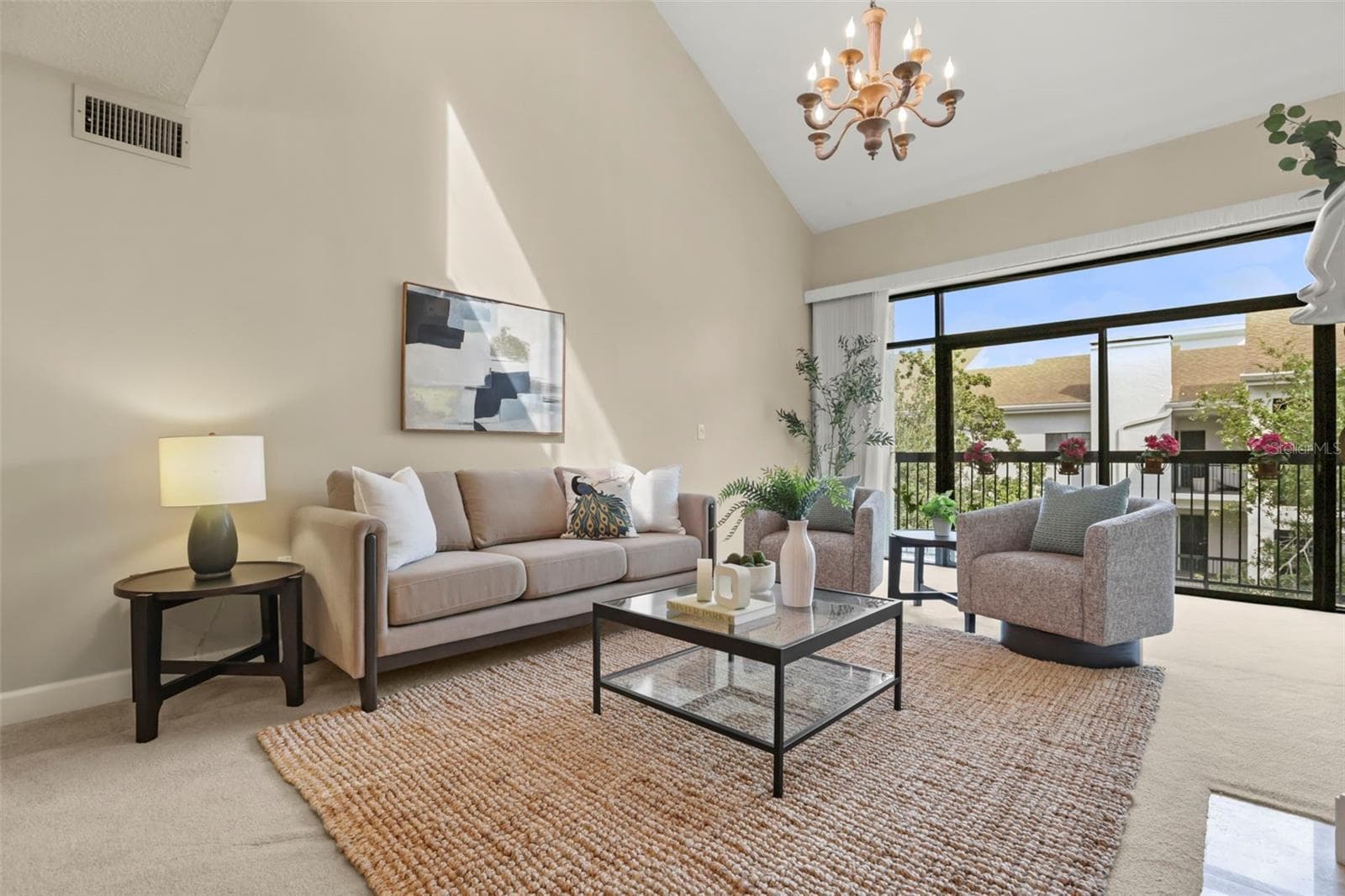 Stress-free condo living doesn't mean smaller space in this spectacular home. The living room is open, bright, and spacious! - 300 CAROLINA AVE #402C, WINTER PARK