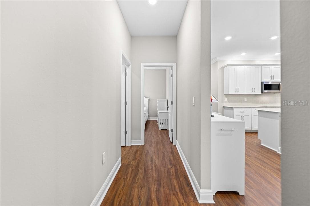 Hall Leading to the 3rd Bathroom and 4th bedroom - 16 Elder CT E, HOMOSASSA FL 34446, Homosassa