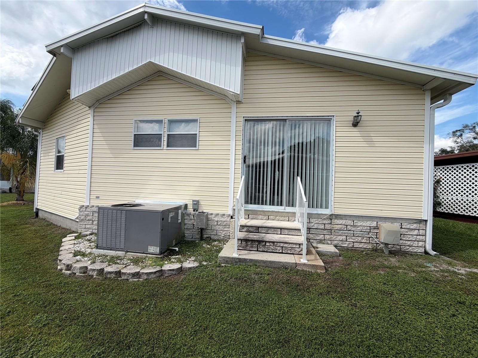 Rear showing A/C - 35248 TIFFANI CT #Lot 064, ZEPHYRHILLS