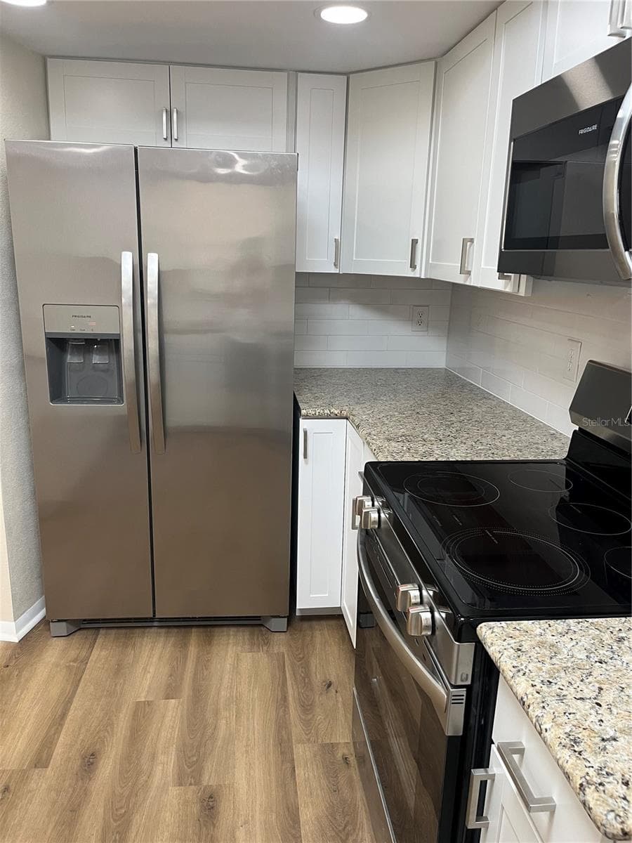 Single Family Residence at 2080 SUN TREE CIR N, CLEARWATER, photo 4 of 15