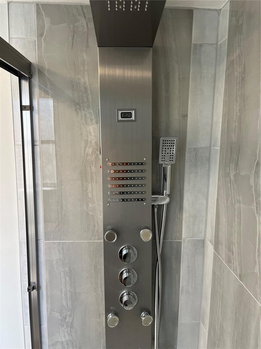 Deluxe Shower System in Ensuite Bathroom. - 2080 SUN TREE CIR N, CLEARWATER