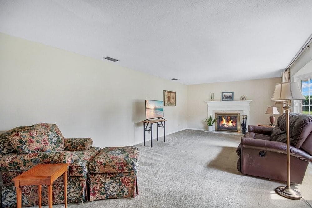 Formal Living Room with Fireplace - 109 PINE NEEDLE LN, ALTAMONTE SPRINGS