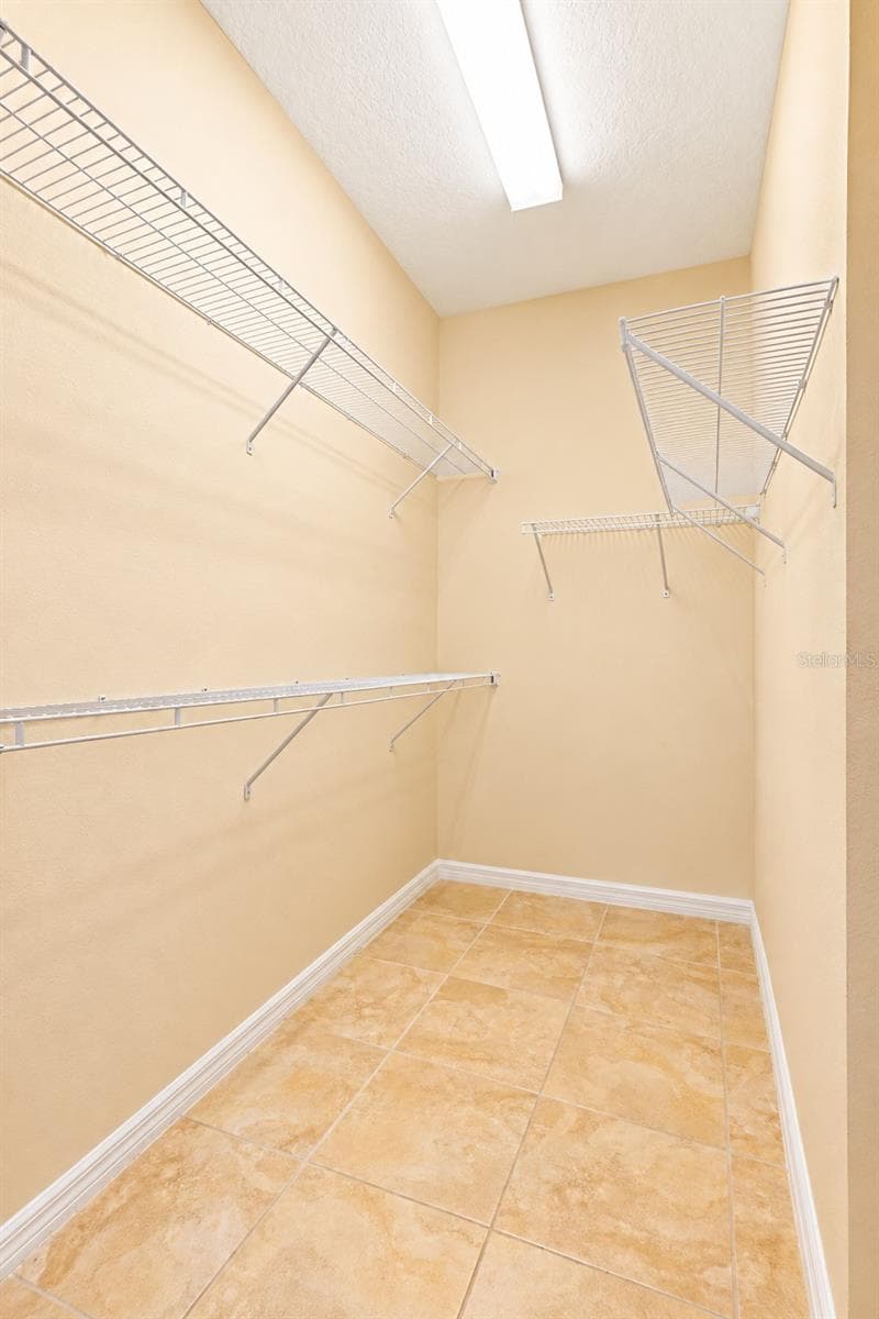 Primary walk in closet - 120 MONTORO, DAVENPORT