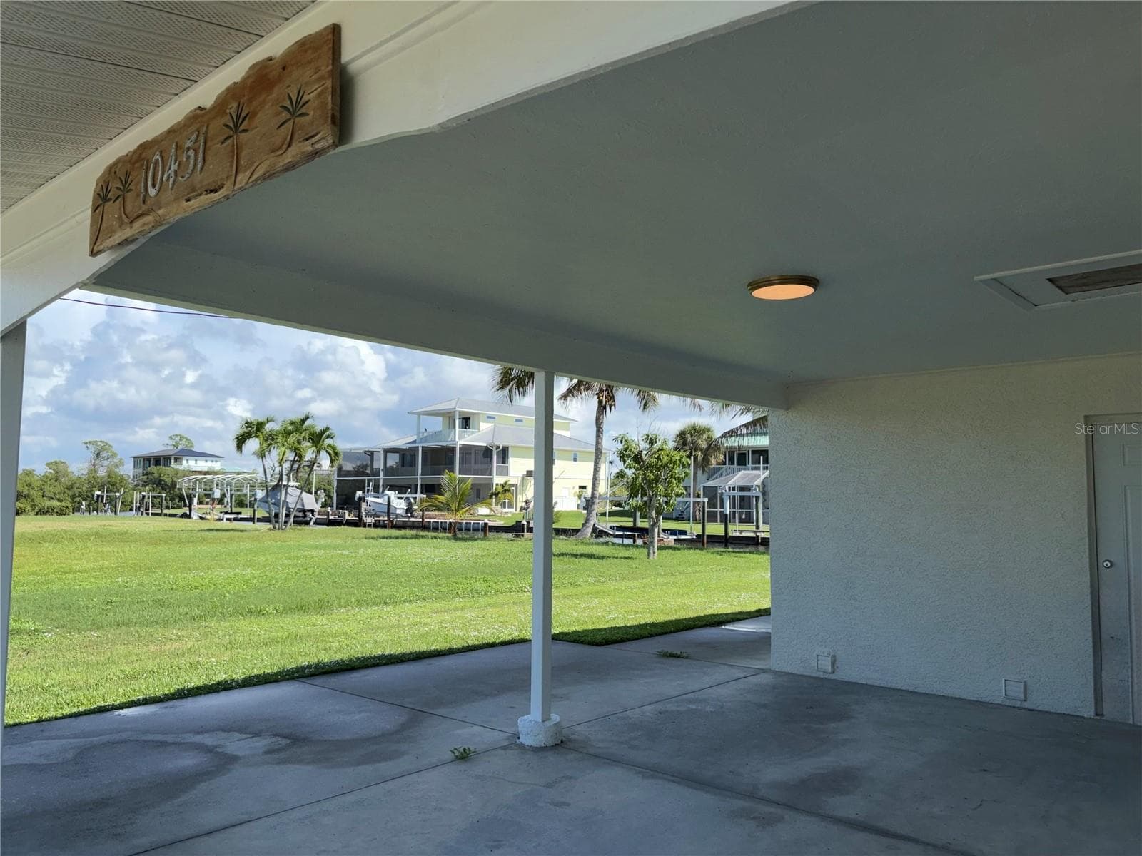 Carport with access to home through second bathroom - 10451 MARION ST, ENGLEWOOD