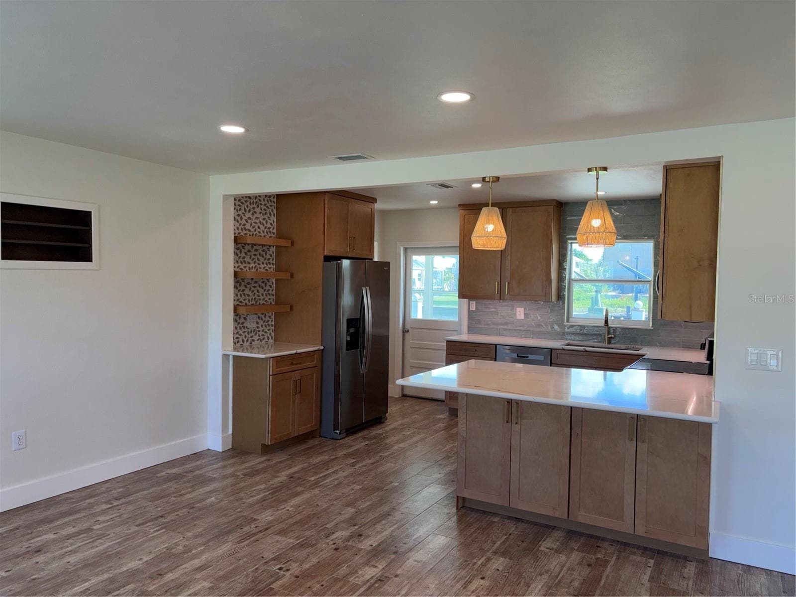 View from living/dining area toward kitchen and Florida Room - 10451 MARION ST, ENGLEWOOD