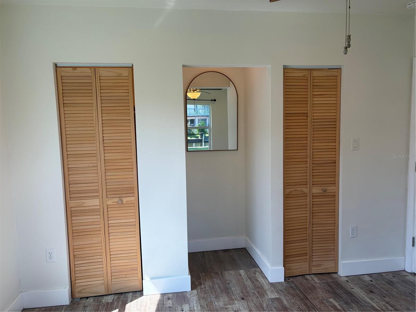 Primary bedroom with two closets and a lighted nook perfect for a small dresser - 10451 MARION ST, ENGLEWOOD