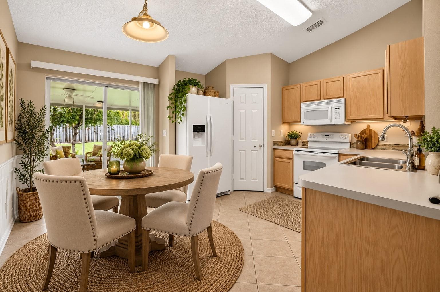 virtually staged dining - 2316 WILLOW OAK DR, EDGEWATER