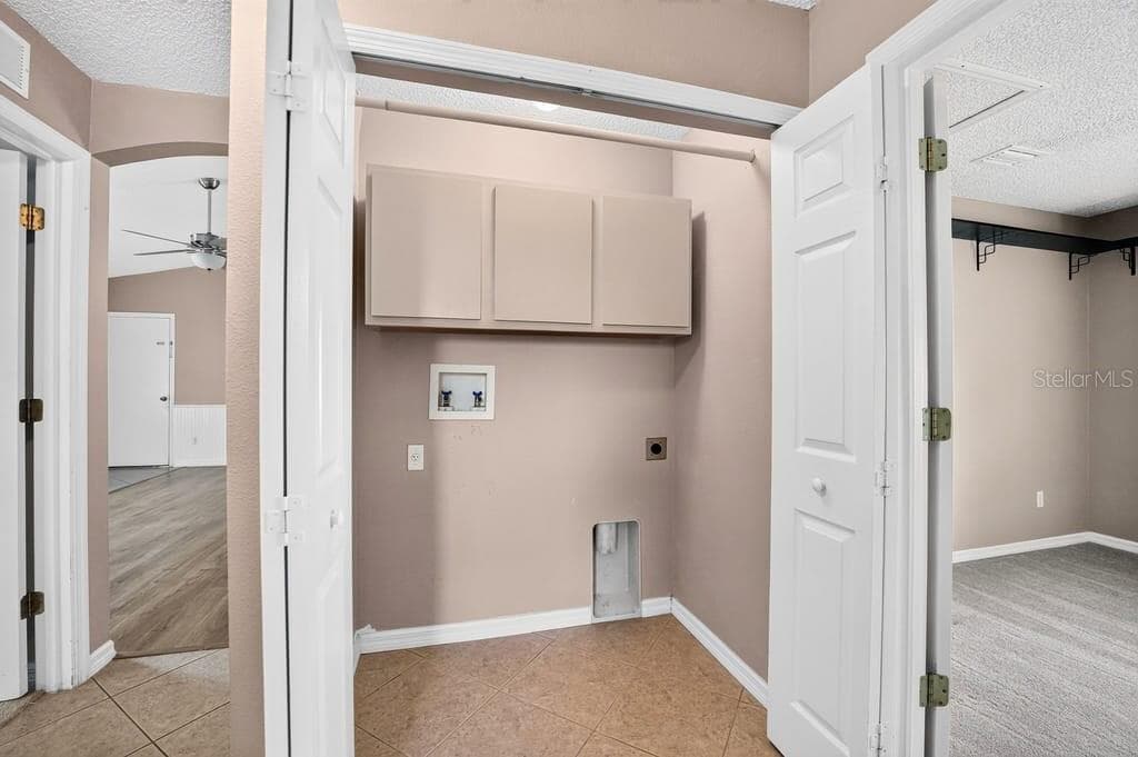 laundry closet - 2316 WILLOW OAK DR, EDGEWATER