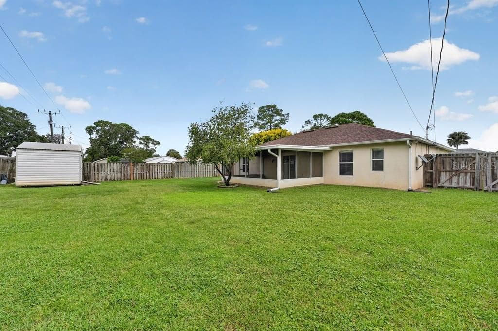 rear of home - 2316 WILLOW OAK DR, EDGEWATER