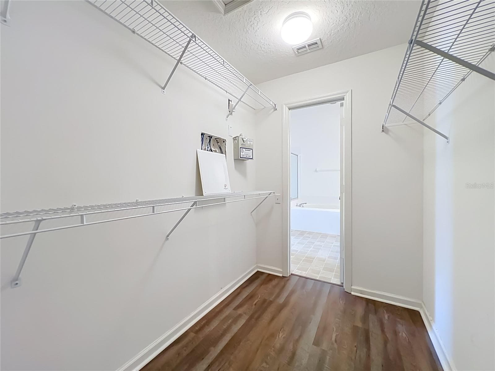 primary walk-in closet - 1199 SNUG HARBOR DR, CASSELBERRY