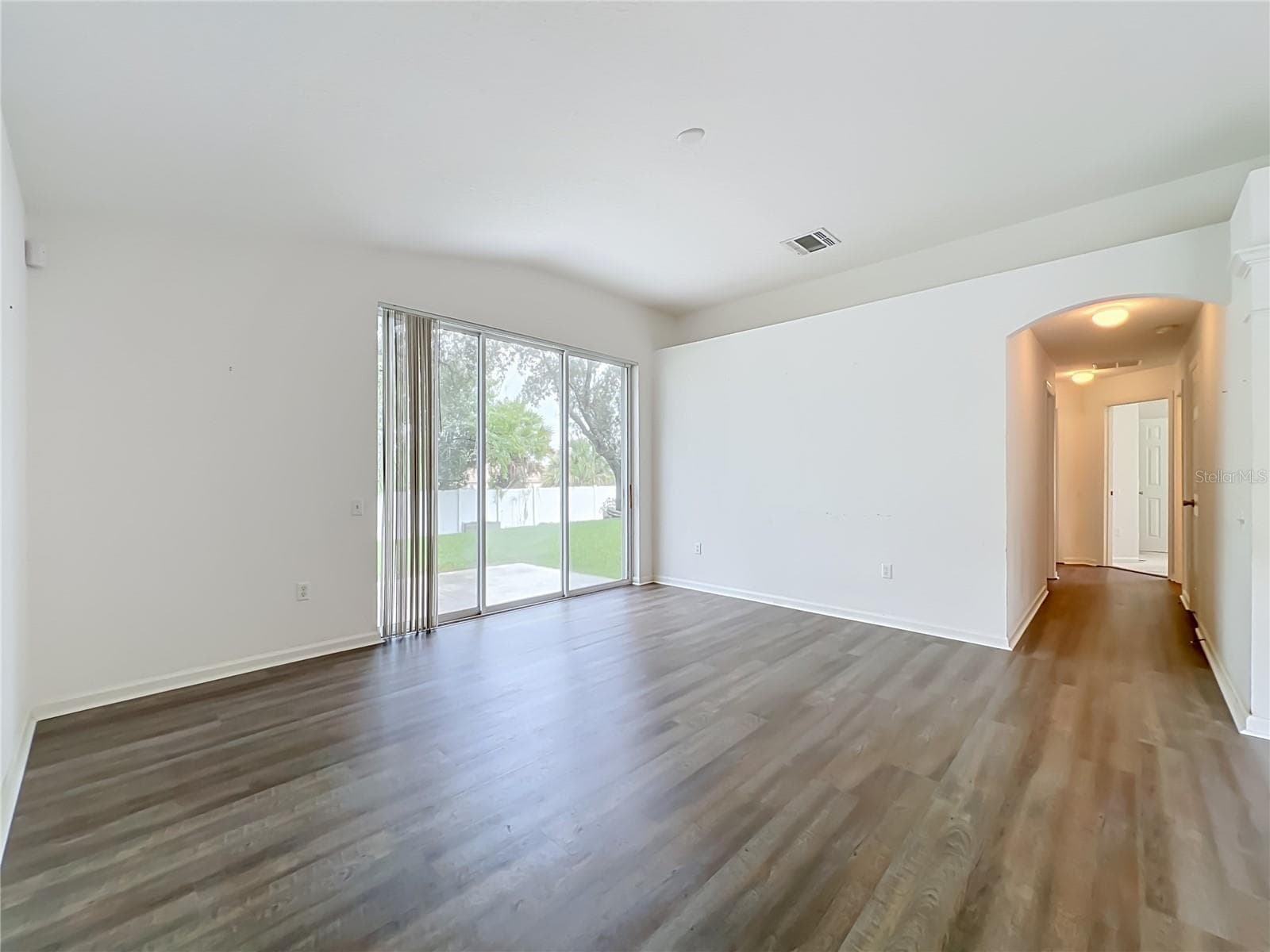living room and bedroom hallway - 1199 SNUG HARBOR DR, CASSELBERRY