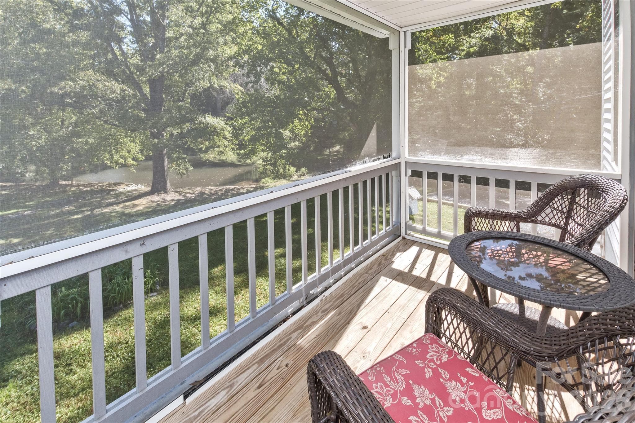 Screened Room looking out to the community pond - 2911 Middleton Place, Hendersonville