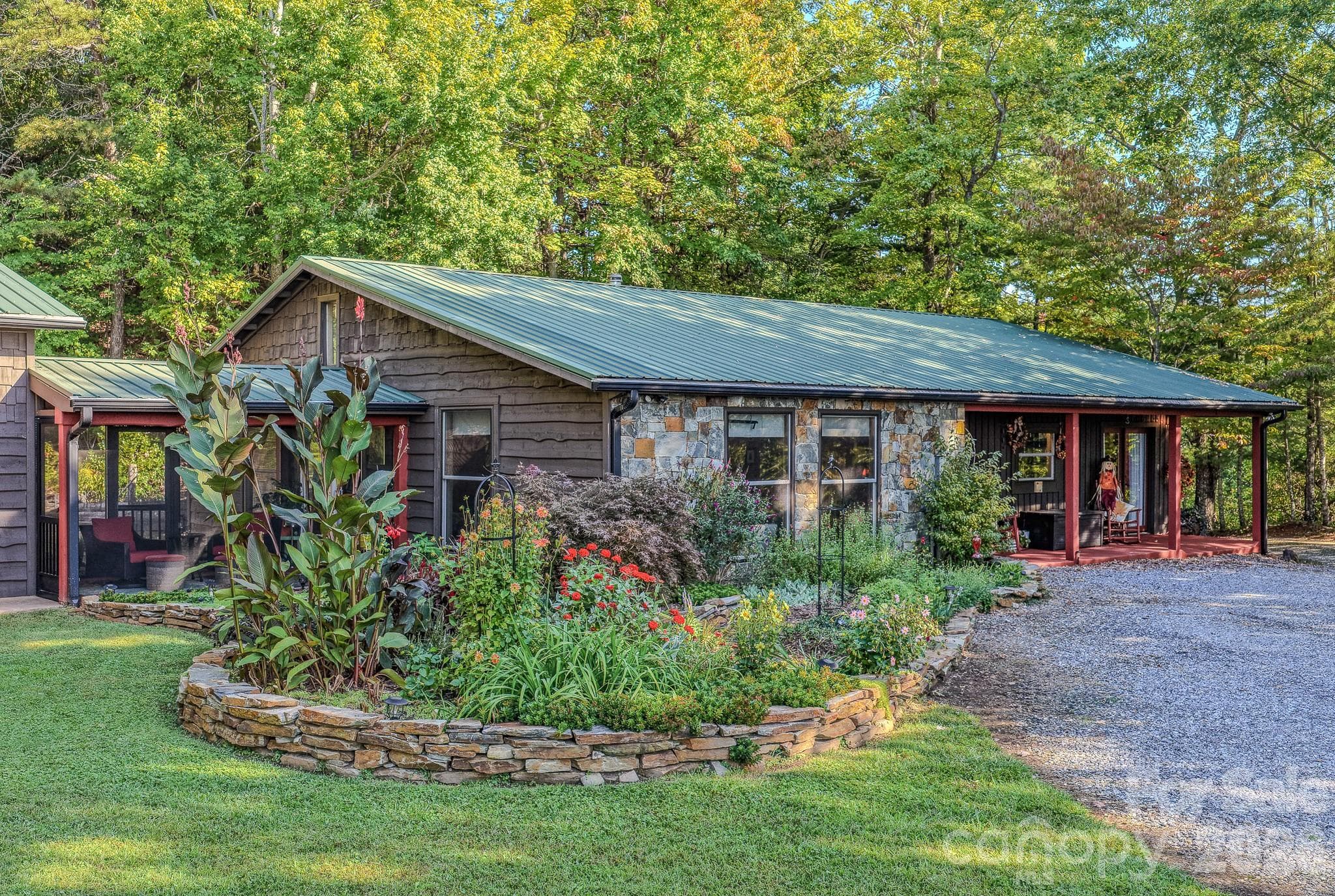 Beautifully landscaped gardens that change with the seasons, from the fairy garden to the fenced backyard. - 54 Winning Way, Old Fort
