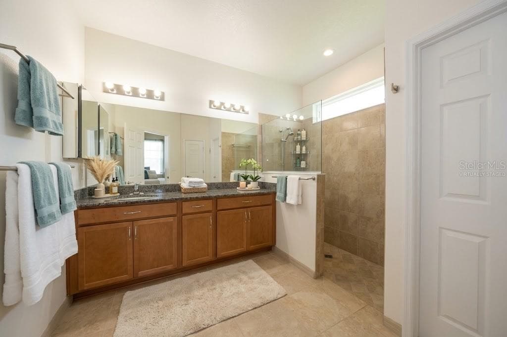 Virtually staged primary bath - 85 S CIMMARON DR, PALM COAST