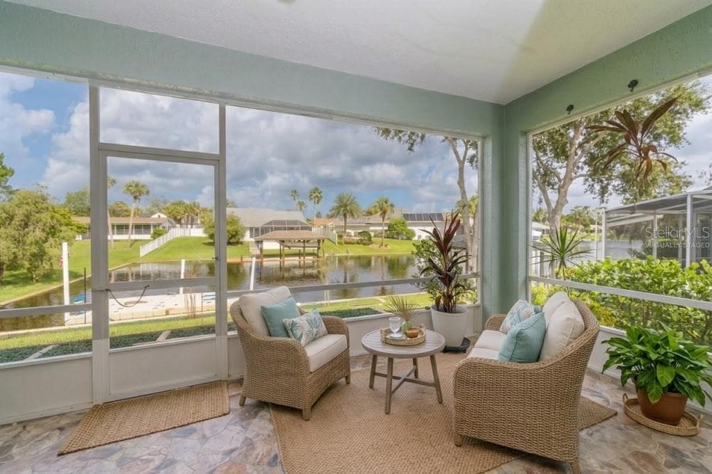virtually staged lanai - 85 S CIMMARON DR, PALM COAST