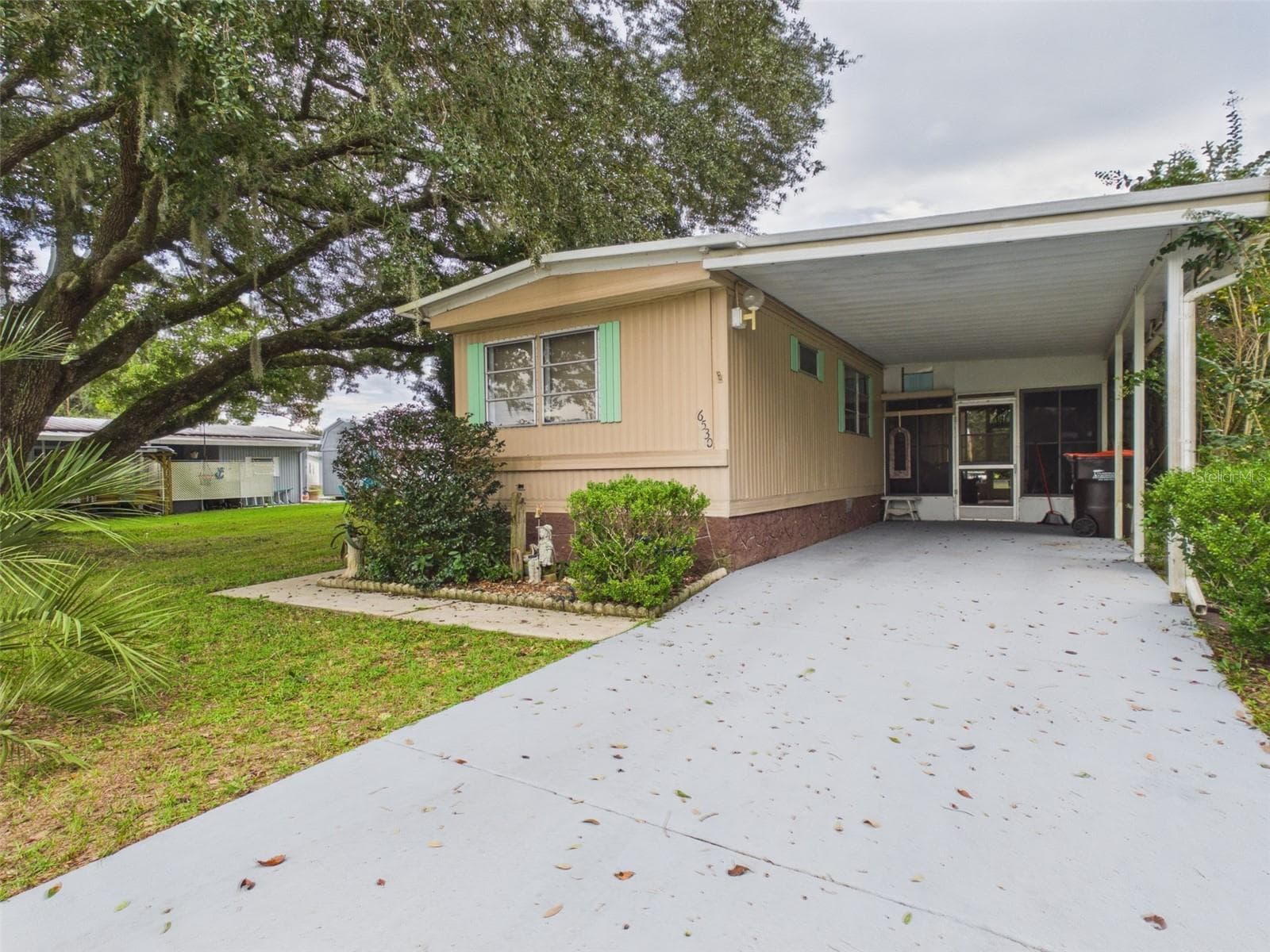 Mobile Home at 6530 NE 2ND PL, OCALA, photo 2 of 21