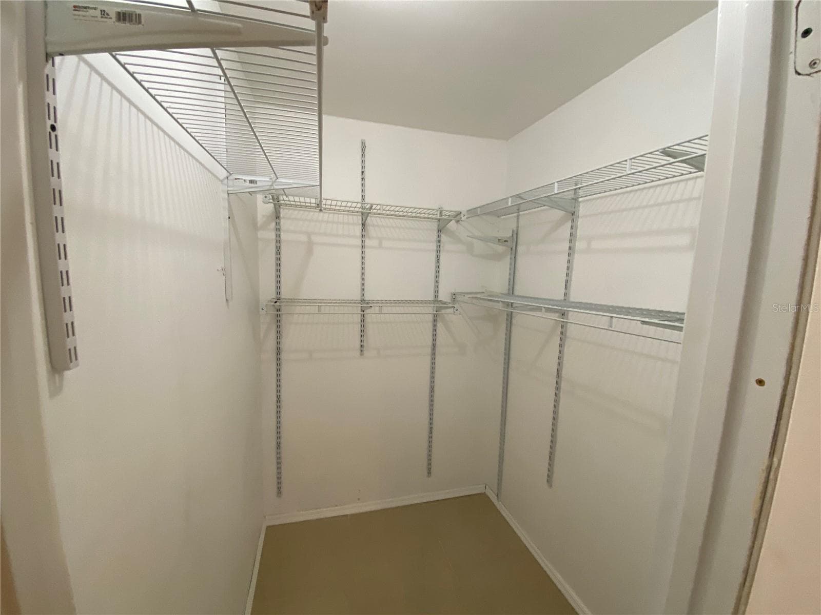Primary Walk In Closet. - 82 LAKEPOINTE CIR #82, KISSIMMEE