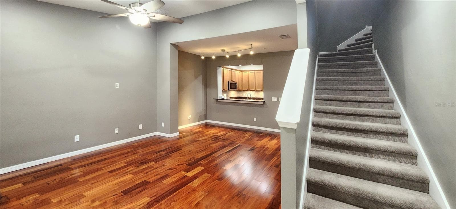 Living + Dining Room. Stairs to Second floor - 491 HARBOR WINDS CT, WINTER SPRINGS
