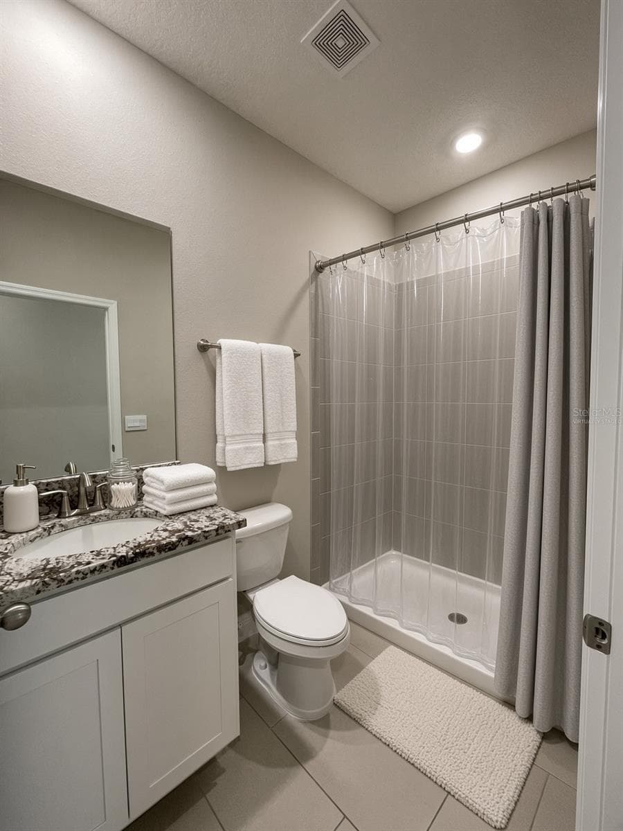3rd Bathroom - First Floor (Virtually Staged) - 140 BRIGHT IBIS AVE, APOLLO BEACH
