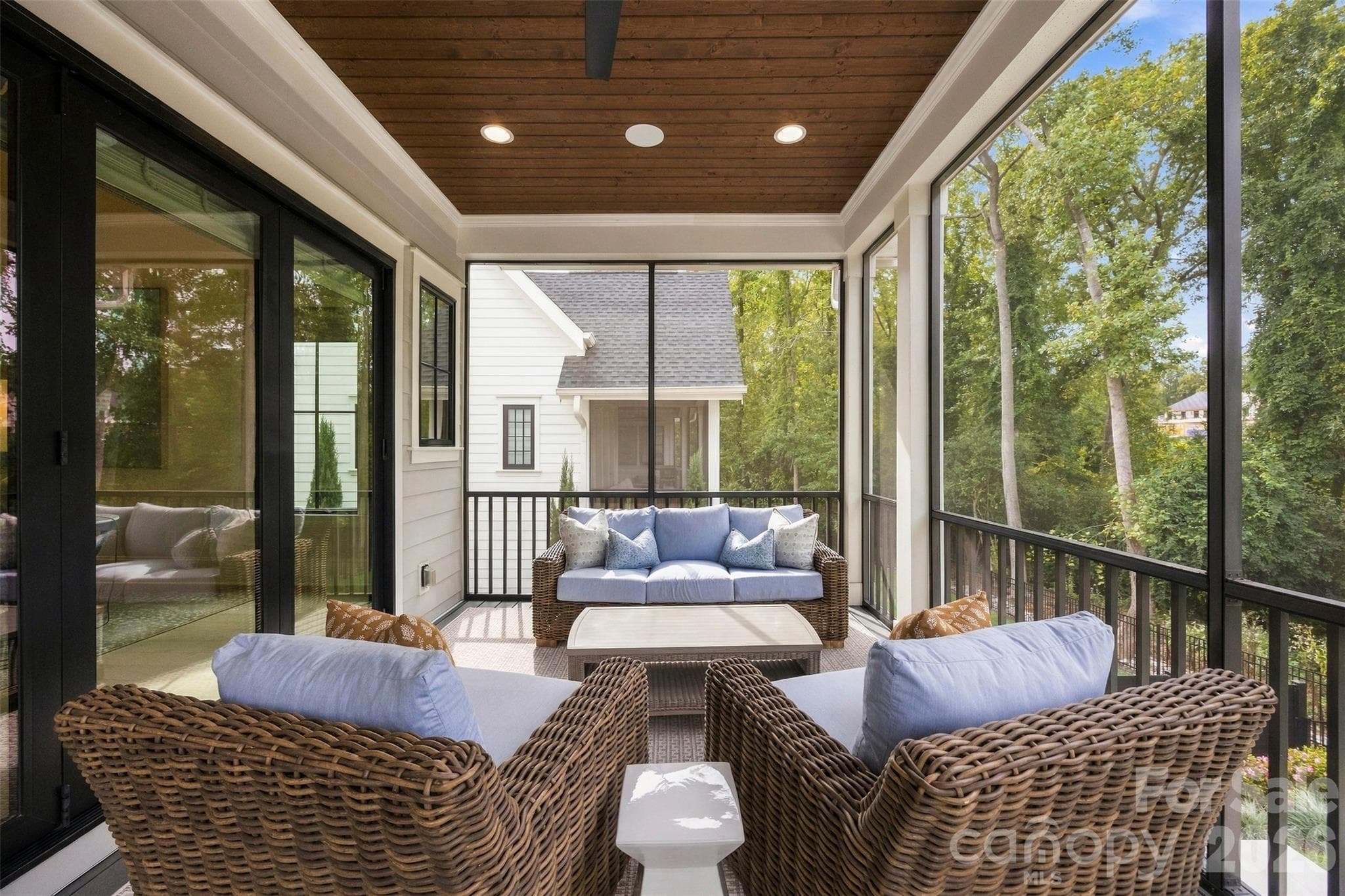 Screened porch just off the family room. - 6222 Louis Patrick Lane, Charlotte