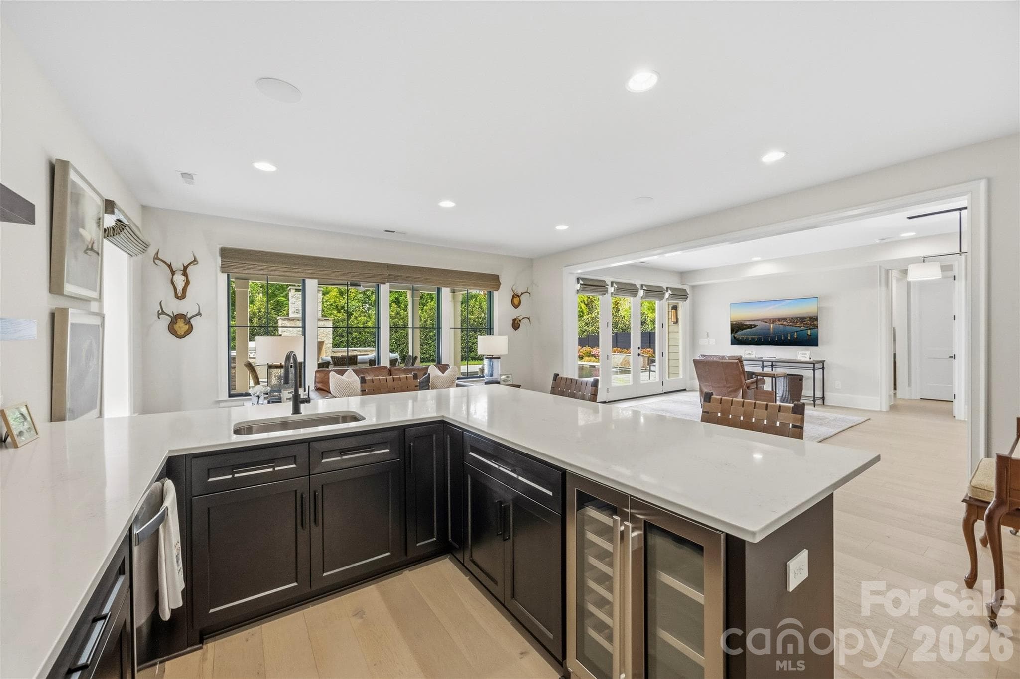 Ice machine, wine cooler, dishwasher and wet bar in lower level - 6222 Louis Patrick Lane, Charlotte