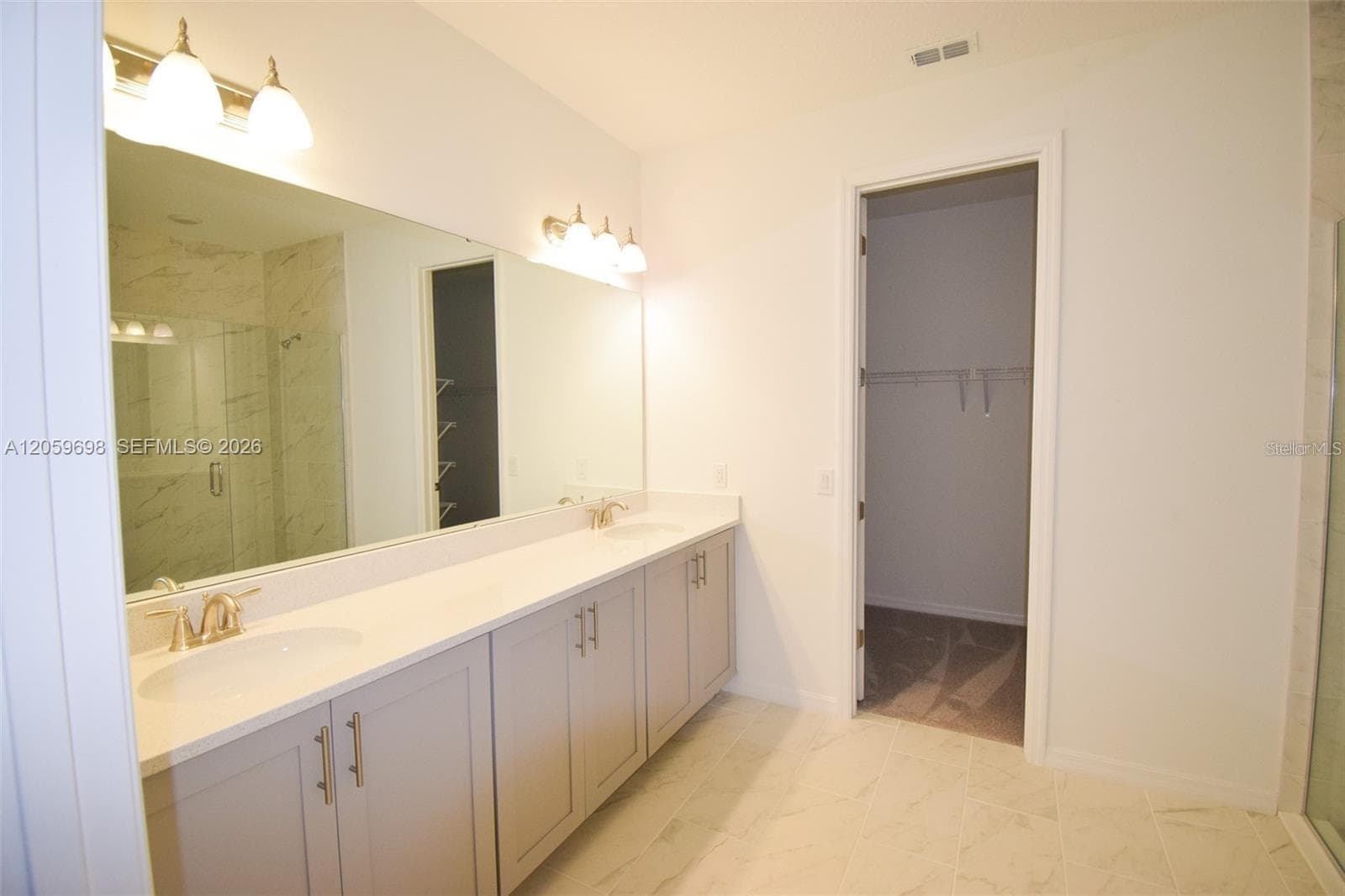 Spacious Primary Bathroom with Dual Vanity - 2370 LANCASHIRE ST, DAVENPORT
