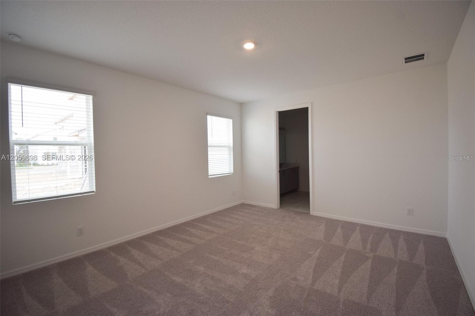Bright Bedroom with Multiple Windows - 2370 LANCASHIRE ST, DAVENPORT