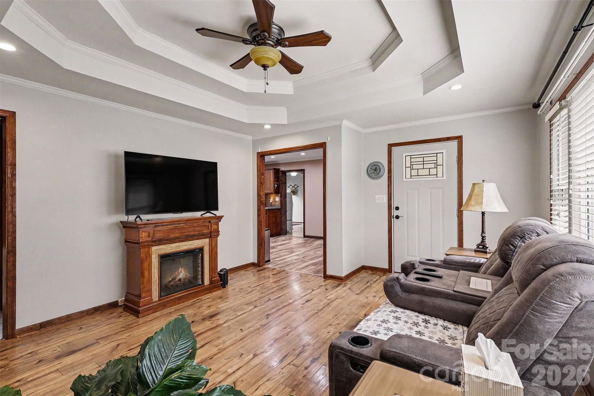 Living Room with Tray Ceiling and updated floors - 9202 Elgin Drive, Charlotte