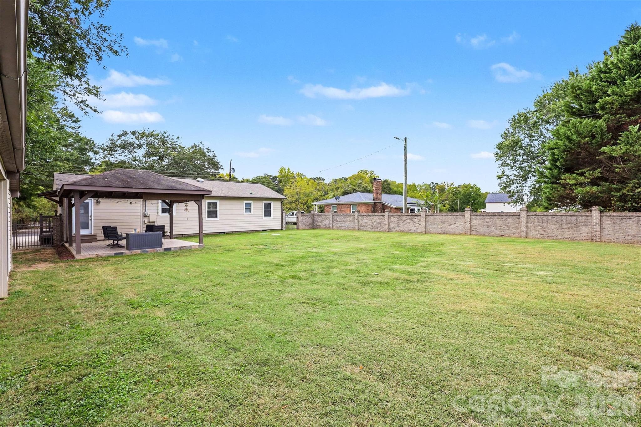 Backyard view with Gazebao - 9202 Elgin Drive, Charlotte