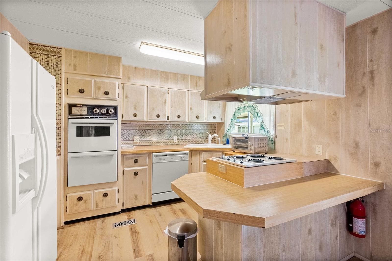 Plenty of storage in this kitchen. - 5244 JO ST, ZEPHYRHILLS