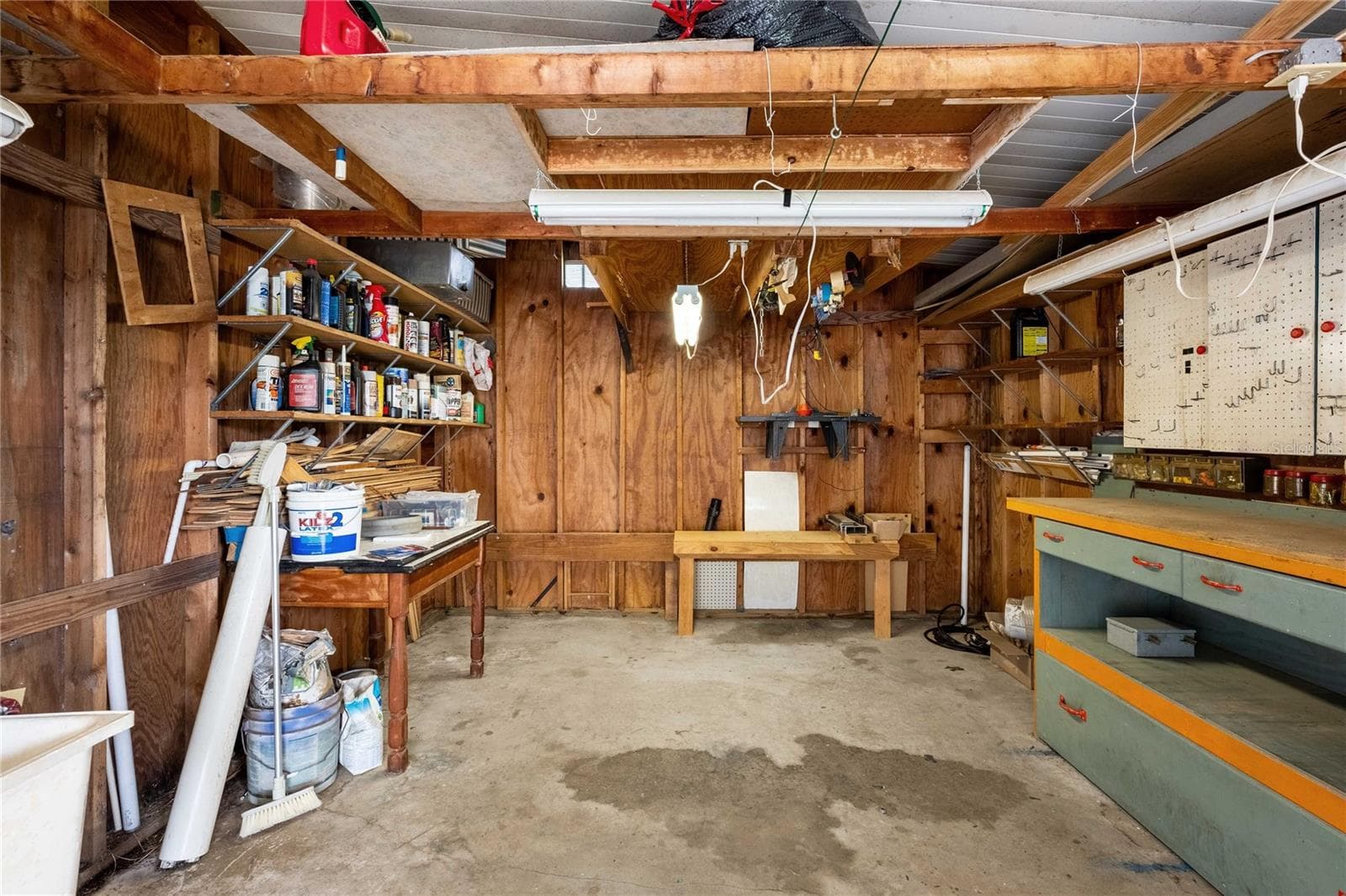 Garage and workshop on this home. - 5244 JO ST, ZEPHYRHILLS