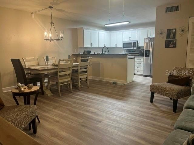 Living room, Dining room, Kitchen Combo - 3389 CRYSTAL CT E #D, PALM HARBOR