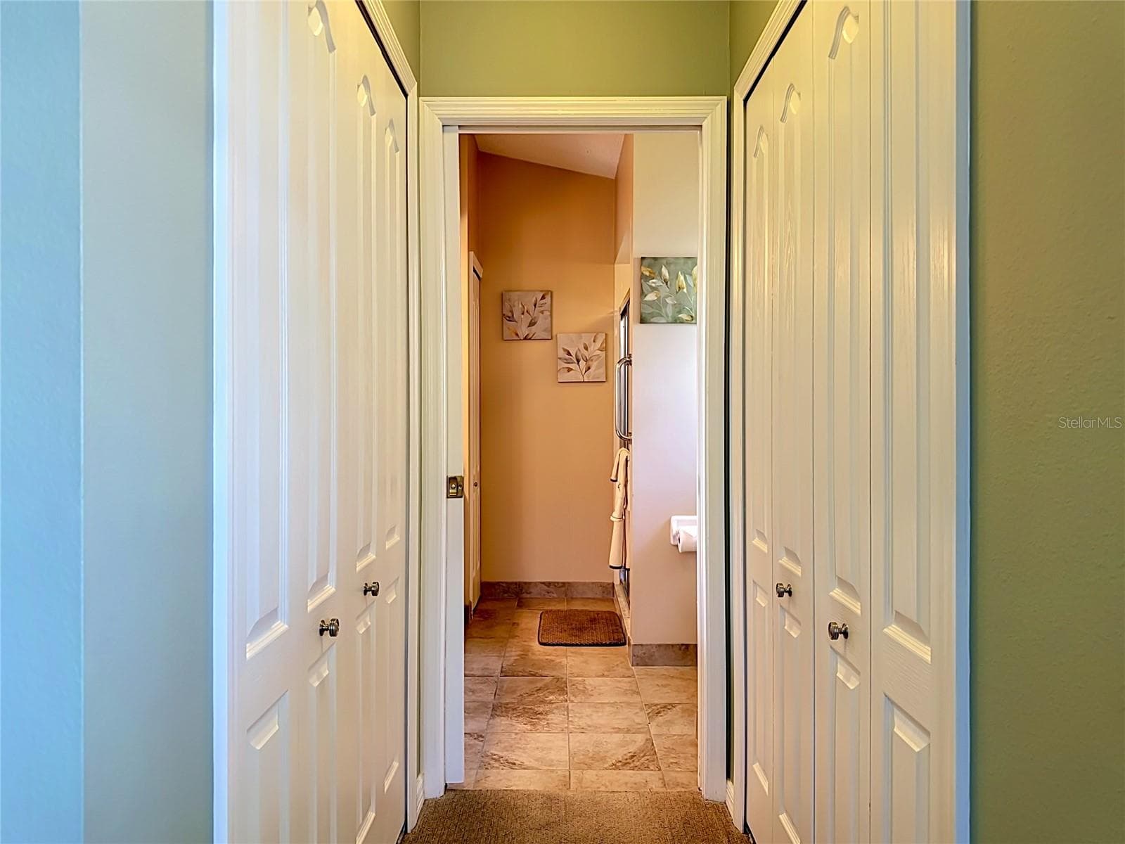 Primary Bedroom Hallway with closets - 4547 FERN DR, BRADENTON